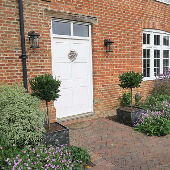 Elizabethan farmhouse garden design in Guildford, Surrey